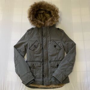 Fur-lined jacket with fur hood